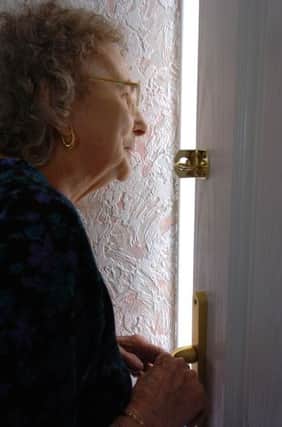 Dorothy Slingsby from Manor Park takes precautions against bogus callers and burglars