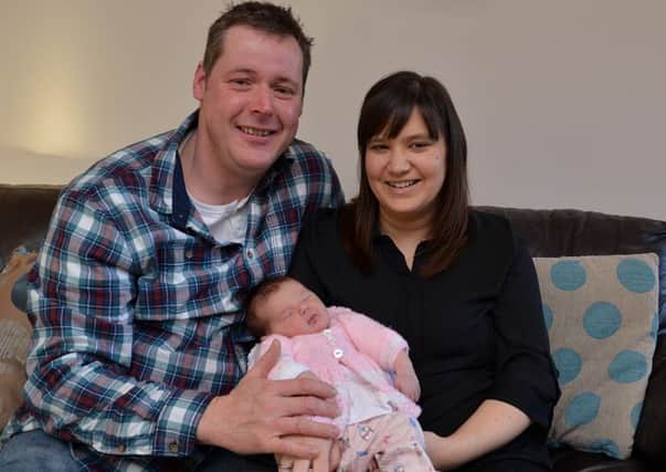 New Years Day baby Abigail Sissons pictured with Dad Dean and Mum Hayley