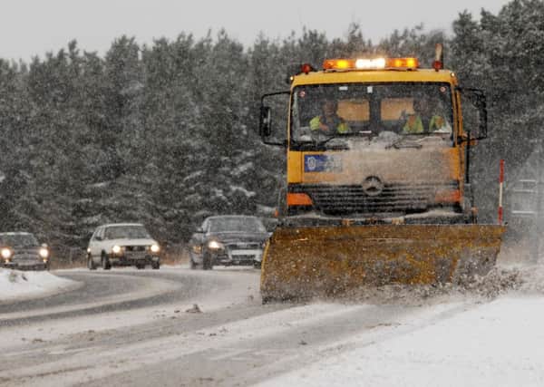 A gritter in action. Stock picture.