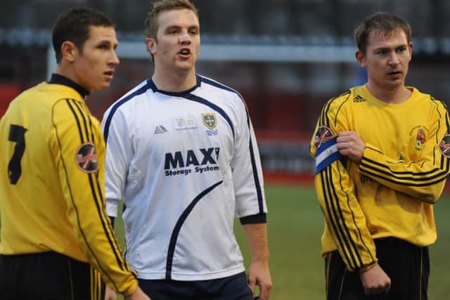New Manor Ground, Ilkeston.
Worksop Town FC vs Guiseley
Picture: Guiseley player Steve Burton pictured between Ben Tomlinson and Kevin Davies.