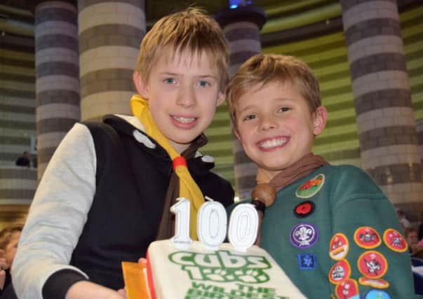 Members of 7th Retford Cubs with a Cub100 birthday cake