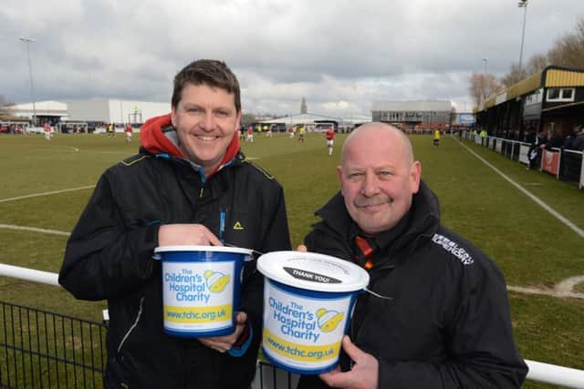 Worksop Town FC in support of the Children's Hospital Charity.  Pictured at the Worksop Town v FC United of Manchester match is the Children's Hospital Charity corporate fundraiser Tchad Western and Kev Keep.