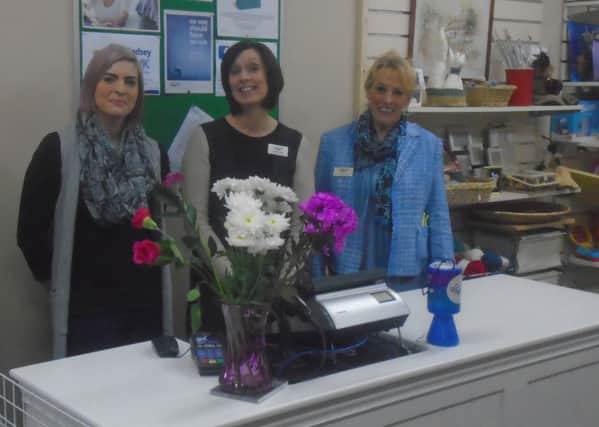 Amy Fahy, Deputy Manager; Sarah Roberts, Area Manager and Liz Reynolds, Shop Manager.