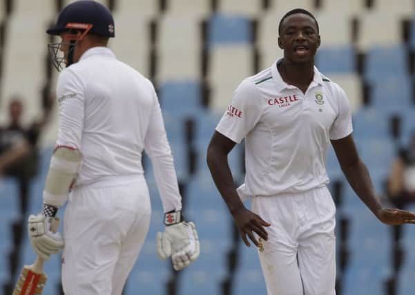 South Africas bowler Kagiso Rabada, right, celebrates after dismissing Yorkshire batsman Jonathan Bairstow, left, for 14
