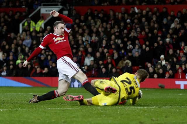 Steelphalt Academy graduate George Long denies Wayne Rooney of Manchester United 
Â©2016 Sport Image all rights reserved