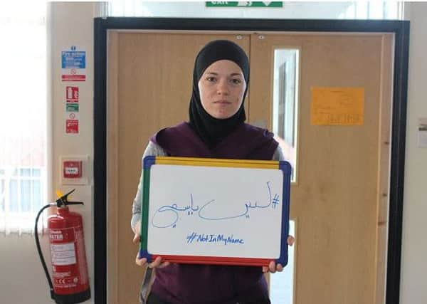 Miss Abdulkarim showing her support to tackle extreme views during Dinnington High School's Random Act of Kindness week