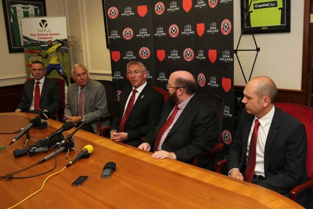 Nigel Adkins and his staff with members of the Sheffield United hierarchy 
Â© Blades Sports Photography
