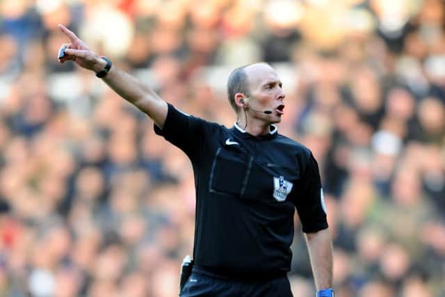 Mike Dean is set to take charge of this weekend's game with Doncaster Rovers