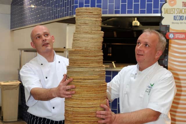 Centre Parcs Pancake House, World Record attempt.
Group Executive chef, James Haywood, right and executive sous chef, Dave Nicholls with their record breaking pancake stack.