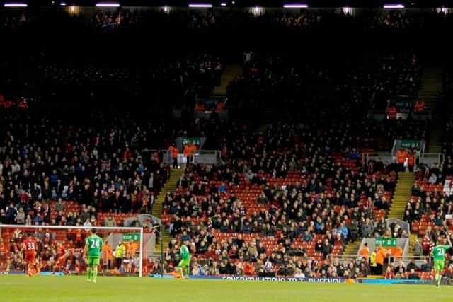 The Kop end after fans walk out on 77 minutes in protest over ticket prices at Anfield