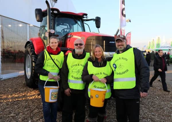 Staff and volunteers raised more than Â£8,000 for the Lincolnshire & Nottinghamshire Air Ambulance at the LAMMA show