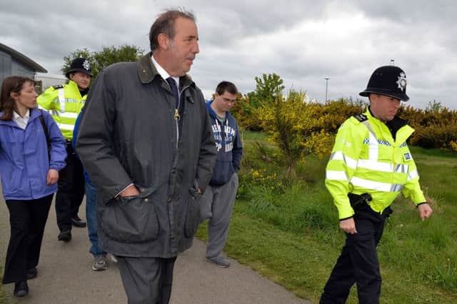 Nottinghamshire's Police and Crime Commissioner, Paddy Tipping on walkabout with Notts Police officers