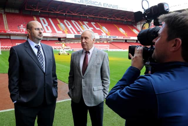 Sheffield United's co-owners on the pitch at Bramall Lane

Â© BLADES SPORTS PHOTOGRAPHY