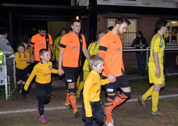 Worksop Town FC v Retford United, Worksop Town Junior's walk out with the team
