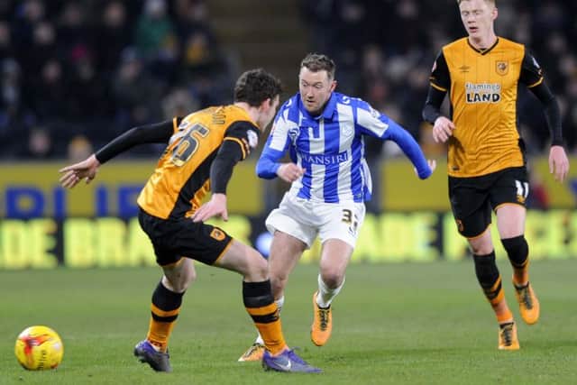Owls Aiden McGeady takes on the City defence