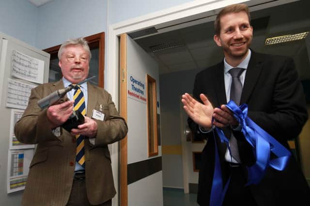 Simon Weston OBE officially opened a new operating theatre at the Barlborough NHS Treatment Centre. Simon is pictured cutting the ribbon to open the new theatre.