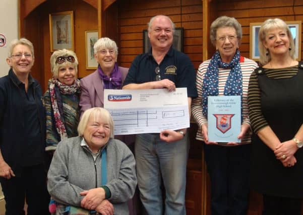 The Friends of the Gainsborough Girls High School presenting a cheque of Â£691.26 to the Chairman of the Gainsborough and District Heritage Association