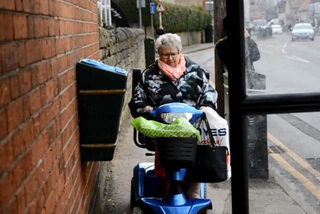One gentleman in a mobility scooter was forced to drive in the road, but Pensioner Diane Humphries was just about able to squeeze through.