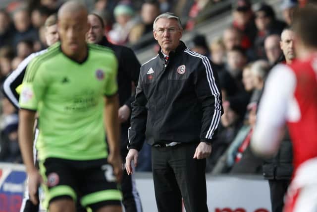 Sheffield United manager Nigel Adkins runs the rule over Baptiste 
Â©2016 Sport Image all rights reserved