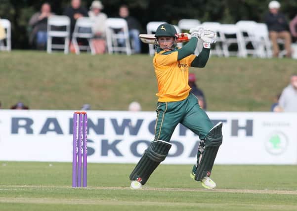 James Taylor hammers home a boundary for the Notts Outlaws - Pic by: Richard Parkes