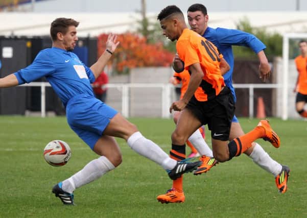 Worksop Town v Nostell Miners Welfare. Tigers player Andre Johnson in action.