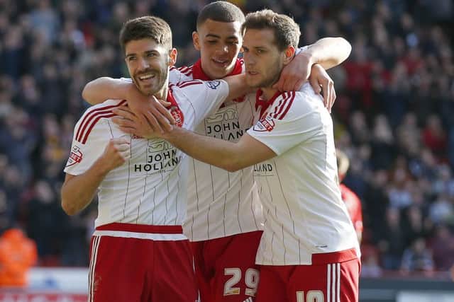 Ryan Flynn of Sheffield Utd celebrates his goal with Che Adams and Billy Sharp