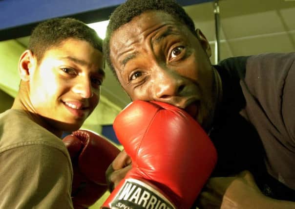 Ouch! Johnny Nelson gets a whack from a 14 year old Kell Brook