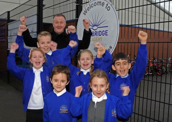 Headteacher George Huthart and pupils from Norbridge Academy, Worksop celebrate on achieving an outstanding Ofsted report. Picture: Andrew Roe