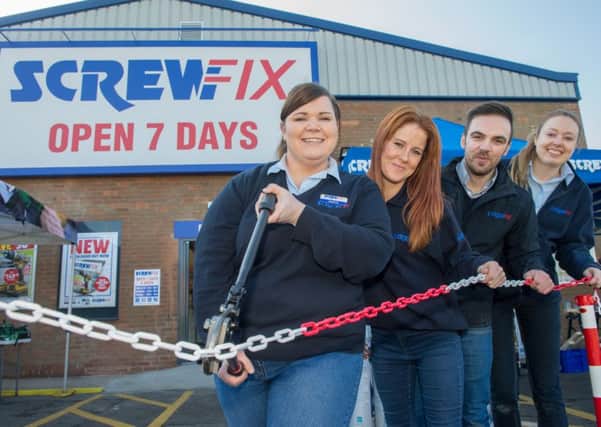 ScrewFix store opening at Gainsborough. Manager Jessica Russell, Kara Grimes, Asst Manager Mark Hubbard and Lorna Middleton perform the opening ceremony.