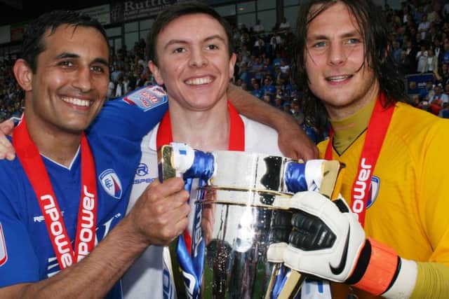 FP89913  CFC players Jack Lester, Gregor Robertson, Tommy Lee with the champions trophy.