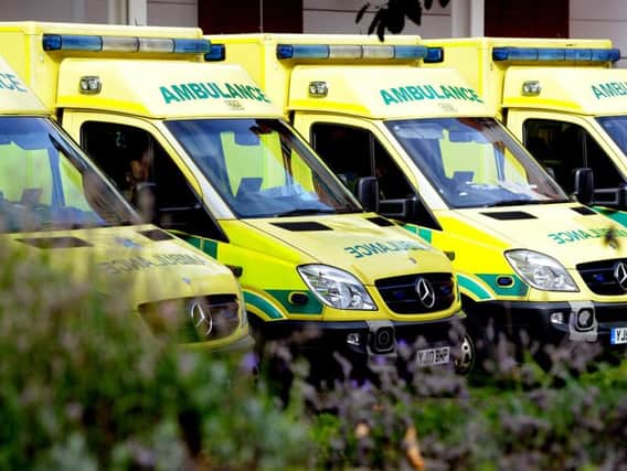 East Midlands Ambulance Service was fined millions last year for missed targets as it announces a debt crisis and plans to merge with another service.