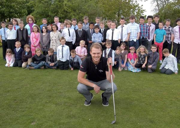 Pro golfer Danny Willetts visited Bondhay Golf Club for a golf clinic and presentation. Danny is pictured with the children of club members  (w120514-5a)