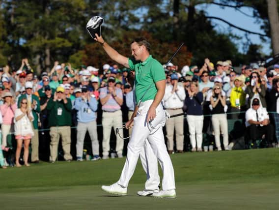 Danny Willett salutes the Augusta crowd after completing his final round at The Masters