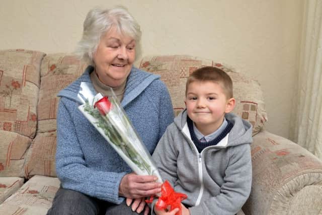 Guardian Rose presentation to Celia Hirst from Grandson Mason Hirst