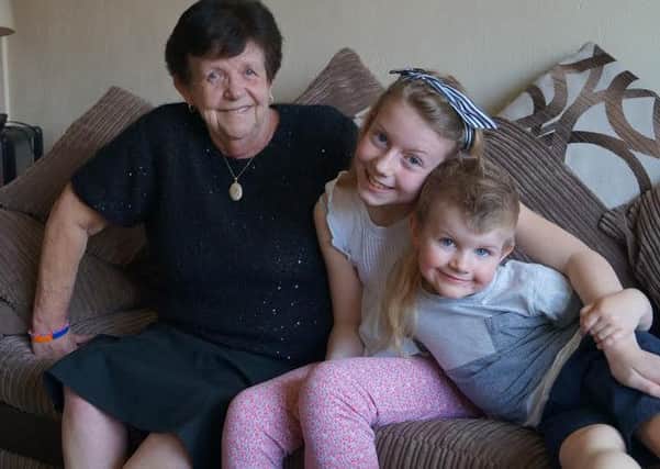 Christine Holland with grandchildren Georgia and Max