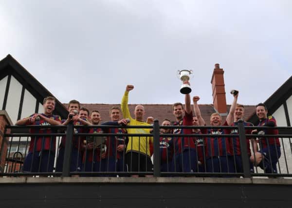 St Joseph's celebrate their Benevolent Cup final victory