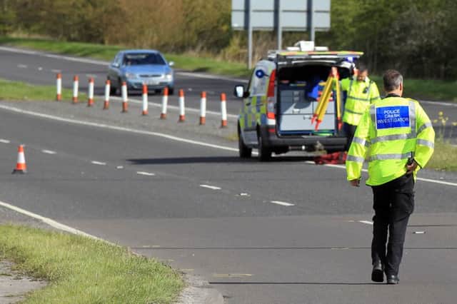 Police at the scene of an incident on the A631 at Beckingham. Photo: Chris Etchells
