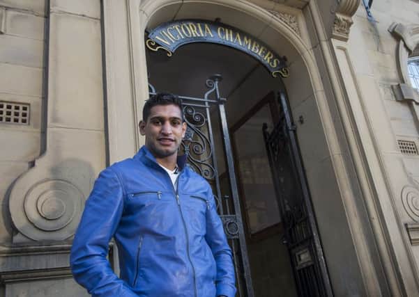 Picture by Allan McKenzie/YWNG - 29/01/15 - Press - Amir Khan Penny Appeal - Wakefield, England - Amir Khan at the Victoria Chambers where the Penny Appeal is based.