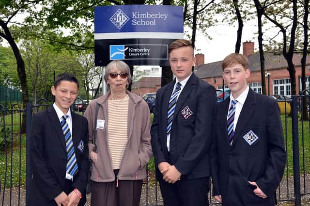 Shirley Walker fell while out in a local park and was helped by three boys who attend Kimberley School, pictured from right with Shirley are Daniel Frogson, 13, Luke Woodcock, 14 and Callum Manning, 15