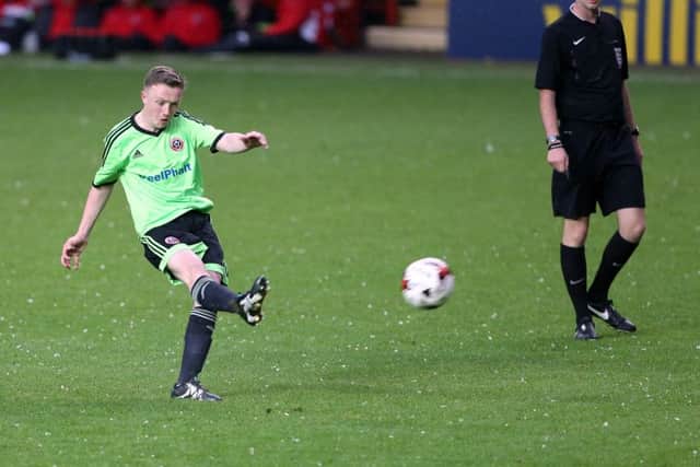 Sheffield United's Jordan Hallam curls home his free-kick
