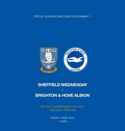 The front cover of Wednesday's match-day programme against Brighton
