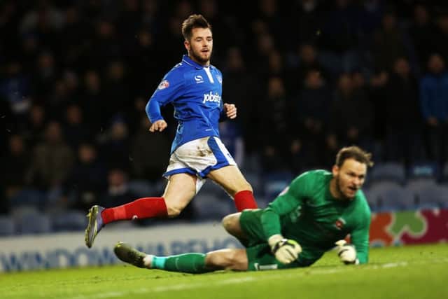 Marc McNulty scores for Portsmouth against Hartlepool United