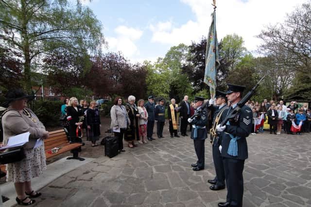 Members of the Polish community, civic dignitries and RAF personell gather at the unveiling of the bench in memory of ex fighter pilot Wladyslaw Jan Nowak in Worksop, Notts, United Kingdom, 14th May 2016. Photo by Glenn Ashley.