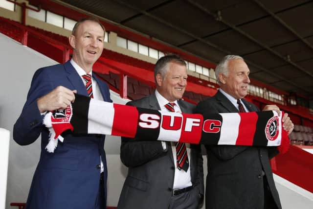 Chris Wilder (centre) with Alan Knill (left) and Sheffield United's co-owner Kevin McCabe 
Â©2016 Sport Image all rights reserved