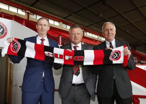 Chris Wilder (centre) with his assistant Alan Knill (left) and Sheffield United's co-owner Kevin McCabe 
Â©2016 Sport Image all rights reserved