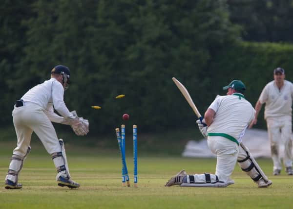 BOWLED HIM! -- Clipstone all-rounder Jason Gorman loses his middle stump, bowled by Papplewick and Linby hero Charlie Blatherwick.