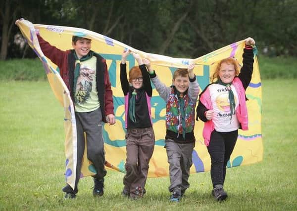 Worksop cubs (from left) Theo McLaughlin, Amelia Whitehouse, Leighton Chambers and Poppy Byard at the Wildest Part Ever to celebrate 100 years of cub scouting