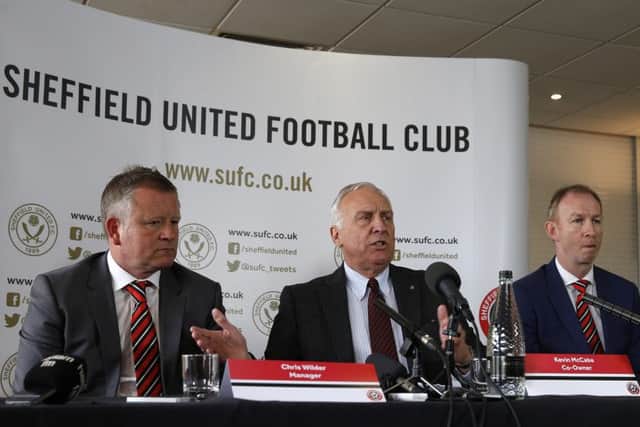 Chris Wilder (left) with Sheffield United's co-owner Kevin McCabe (centre) and assistant Alan Knill Â©2016 Sport Image all rights reserved