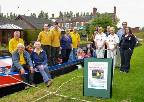 Sponsored boat pull to raise money for the Woodlands Country Park and upkeep of Dawn Rose