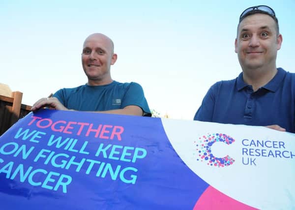 Gavin Forshaw, left  and Steve Carroll who are walking from Worksop to Lincoln to raise money for Cancer Research UK.